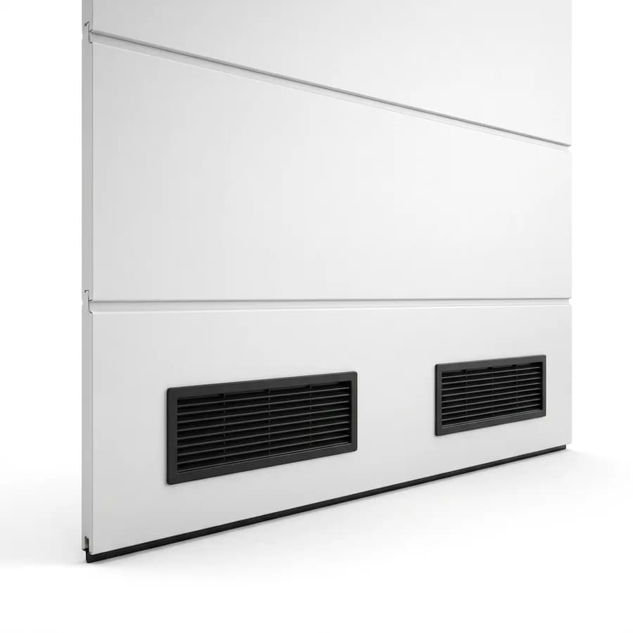 Panneau bas de porte sectionnelle équipé de grilles de ventilation
